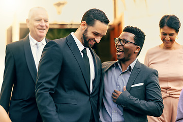 Image showing Wedding, guests and friends laughing in celebration, bond and enjoying conversation, happy and joy. Diversity, people and marriage ceremony by cheerful group having fun, celebrating at formal event