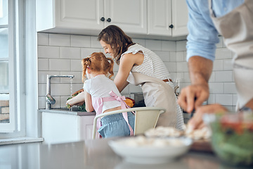 Image showing Washing vegetables, cooking and food with a mother and daughter cleaning ingredients together in the kitchen. Family, help and health with a woman and girl using a sink basin to clean before a meal