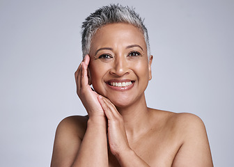 Image showing Portrait, beauty and healthy skincare for mature woman and happy with cosmetic dermatology treatment on a grey studio background. Healthy skin and senior female content with fresh, glowing skin