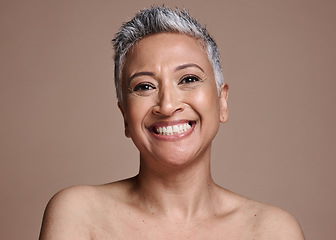 Image showing Portrait, cosmetics and senior woman with skincare, for natural beauty, wellness and confident against studio background. Makeup, happy mature female or elderly lady with smile, health or smooth skin