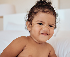 Image showing Baby, face and relax in bedroom for skincare morning routine in family home, Portrait of young infant child, happy healthcare toddler and happiness smile for facial care wellness in bed at home