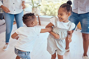 Image showing Family, children and dancing together with energy, love and care of sister and brother for fun and home bonding. Dance, happiness and music with kids enjoying freedom and quality time in family home