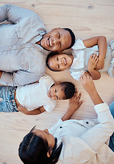 Image showing Family, love and relax on floor together at home for quality time, care or support relationship bonding. Happy family, mom play and comic children smile, laughing and fun for freedom and happiness