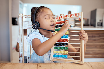Image showing Education, house and child learning math with a colorful child development toy for numbers counting. Headphones, mathematics or creative young kindergarten student home schooling busy with assessment