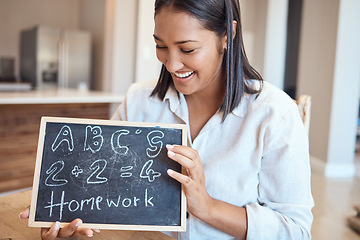 Image showing Learning, education and woman with homework blackboard for studying alphabet and numbers. Abc, mathematics and female teacher or educator from India holding chalkboard with equations and grammar.