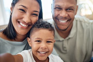 Image showing Mother, father and child in a selfie or portrait in the house living room bonding and enjoying holidays as a family. Mama, dad and happy young boy kid or boy with a big smile loves pictures in Mexico