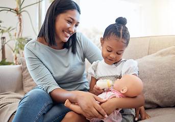 Image showing Mother, love and child with toys happy together on sofa in living room at home for relationship bonding, care and support. Family, mama smile and kid spend quality time or happiness on couch