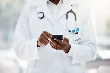 Image showing Doctor, hand and phone browsing the internet for medical reseacrch in a healthcare clinic for medicine. Wifi, social media and online search of cardiologist for examination treatment or cure