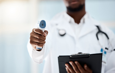 Image showing Covid, temperature and clipboard with doctor measuring fever or cold with a thermometer in a hospital. Medical healthcare, covid19 measure with a clinic professional with a patient chart