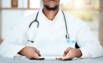 Image showing Black man, doctor and tablet for research, healthcare and browse online for results, information and diagnosis. Medical professional, male and digital device for treatment, stethoscope and innovation
