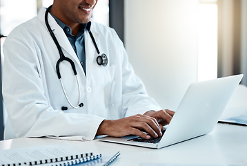 Image showing Doctor, laptop and typing email or online medical prescription for healthcare treatment plan. Hospital, clinic and male physician or specialist browsing digital medicine data or information