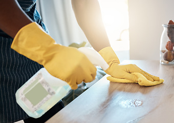 Image showing Hands, hygiene and detergent for clean table, domestic or sanitary for bacteria or dirt removal at home. Hand of health worker cleaning desk with chemical spray bottle and cloth for safety from germs