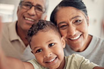 Image showing Selfie, smile and boy with grandparents for a portrait, happy and relax in family home together. Love, care and child with a senior man and woman for a photo, bonding and happiness as a happy family