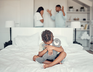 Image showing Sad, fight and boy on the bed with parents in conflict depression, anxiety and stress in their family home. Fear, scared and child with a teddy bear hug while mother and father talk about divorce