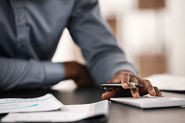 Image showing Accountant, financial planning and bookkeeping man using calculator and paperwork to budget, payroll or profit while doing tax audit or report. Hands of a businessman in office for accounting