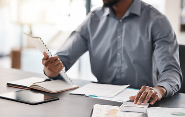 Image showing Calculator, finance and documents with a business man accounting at a desk in his office at work. Budget, financial and investment with a male accounting working on savings or well management