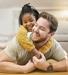 Image showing Father and child hug with love while playing, happy together and care in family home living room. Man with girl smile, bonding and childhood with family and trust, spending quality time at home.