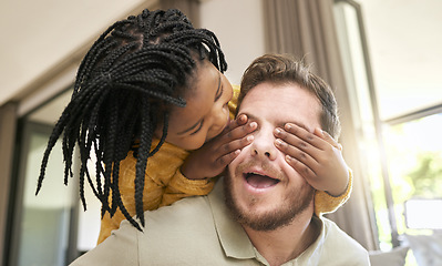 Image showing Family, children and adoption with a peekaboo girl and foster father playing together in the living room of their home. Love, kids and game while a female child surprise her dad in a playful moment