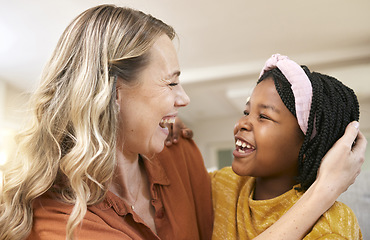 Image showing Love, mother and adoption girl, hug and happy together with smile and bonding in home. Family, mama and black child with embrace, support and happiness with proud female parent and connect with kid