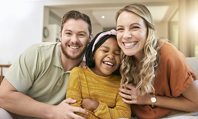 Image showing Family, adoption and happiness portrait with foster child, mother and father together for love, care and trust together on living room couch. Smile, support and laughing man, woman and girl bonding