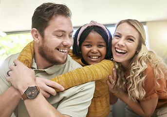 Image showing Family, children and adoption with a girl, mother and father bonding in the living room of their home. Portrait, love and smile with happy foster parents and black daughter together in a house
