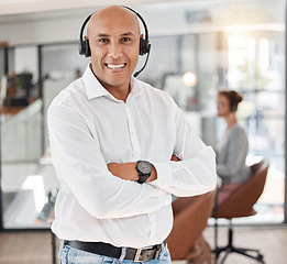 Image showing Businessman, call center and arms crossed with smile for telemarketing, customer service or support at the office. Portrait of happy and confident man in contact us, consulting or online hotline help