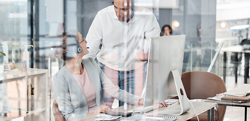 Image showing Glass window, digital call center team and woman at desk talking to manager about faq, contact us and customer support service job. Online telemarketing business staff, CRM sales consultant at desk