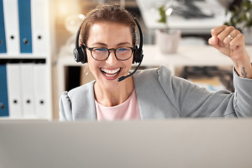 Image showing Woman at call center, celebrate and success at work with winner, successful customer service or sale for telemarketing. Happy about achievement, phone call with victory and contact us, job well done.