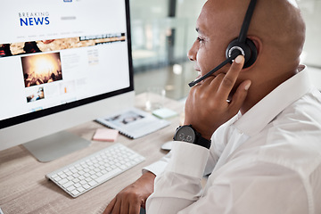 Image showing Call center, man and computer with online news advice for customer service communication. Hotline, operator and crm or contact us telemarketing agent talking on a helpline headset in contact center