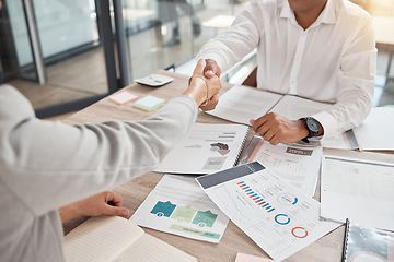 Image showing Marketing, documents and business people handshake in office for deal or onboarding interview. Partnership, b2b and contract agreement, shaking hands and thank you, negotiation and welcome to company