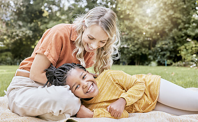 Image showing Relax, mother and adoption child picnic with park blanket for bonding, happiness and wellness. Foster, trust and mama with black kid in South Africa with happy family smile together in nature.