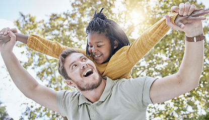 Image showing Father, adopted and girl playing flying outside for fun in a nature garden, enjoying foster diversity. Man, little female child and family with kids and parent playful in green park for childhood