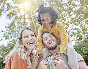 Image showing Diversity, adoption and girl with parents in a park in summer for support, love and care on holiday. Happy, smile and portrait of African child with mother and father in foster care bonding in nature