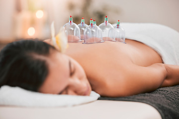 Image showing Spa, physiotherapy or cupping therapy woman for massage, back pain or luxury wellness medical help. Asian medicine, health or relax girl for zen, spiritual or stress healing therapy with vacuum cups