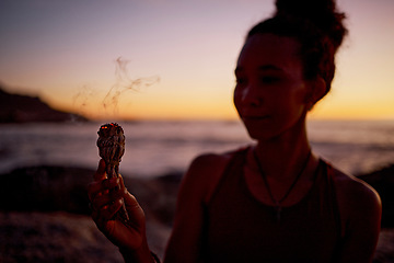 Image showing Burning sage, yoga and black woman with wellness and meditation outdoor, sunrise cleansing ritual. Healing, spiritual with chakra and aromatherapy, cleaning of aura smoke and mindfulness.