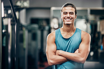 Image showing Personal trainer in gym, portrait of man from healthy lifestyle and fitness motivation of strong guy in Mexico. Confident mexican coach, training body goals with workout and wellness strength trainer