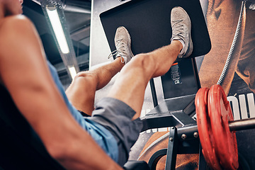 Image showing Exercise, man and legs workout in gym, with machine and training for wellness, health and fitness in sportswear. Male athlete, health and workout with equipment, power and healthy with sneakers.