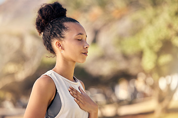 Image showing Black woman, breath and hand on chest, for meditation and wellness being peaceful to relax. Bokeh, African American female and lady outdoor, in nature and being calm for breathing exercise and health