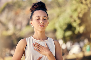 Image showing Yoga, meditation and fitness with a black woman breathing for calm exercise outdoor in a nature park. Wellness, health and meditate with a female yogi finding peace, balance or zen alone outside