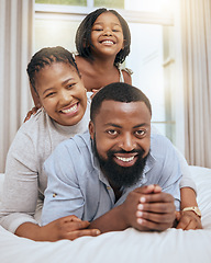 Image showing Love, black family and with girl on bed, happy or smile together for bonding, loving and fun. Portrait, mother and father or parents with daughter in bedroom, quality time and happiness on break