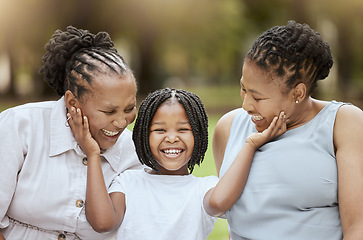 Image showing Mother, grandmother and child in garden, happy family sitting on grass, generations at picnic in park. Black family, women and small girl in nature together with love and support from mom and grandma