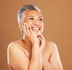 Image showing Mature woman, beauty and happiness for skincare, glow and radiant face skin on a brown background. Cosmetic, skin care, thinking and vision of cheerful senior female model happy with treatment