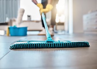 Image showing Man, mopping or cleaning floor in house, home or hospitality hotel for housekeeping product service, maid or worker. Zoom, cleaner or bacteria spring clean, hygiene health or living room maintenance