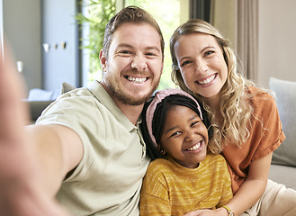 Image showing Happy family, adoption and smile for selfie love, relax or bonding in happiness together at home. Mother, father and adopted child smiling or relaxing for photo moment or capture on living room couch