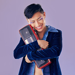Image showing Retro, disco and boom box with asian man and punk makeup for music, creative and festival event. Art, dj and techno with guy and stereo speaker for vintage, cosmetics and rock in purple background