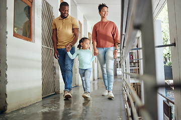 Image showing Black family, parents or girl bonding in animal shelter, community volunteer charity or homeless pets center. Smile, happy child or holding hands and walking mother, father or rescue adoption kennel