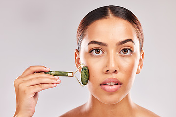 Image showing Beauty, skincare and jade roller with portrait of woman for facial massage, self care and spa wellness mockup. Cosmetics, health and dermatology with girl model for cosmetology, youth and luxury