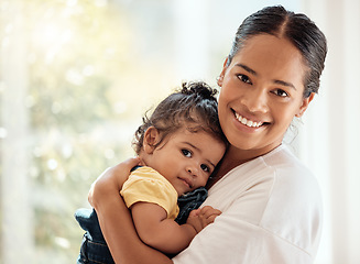 Image showing Mother, baby girl or bonding hug in house bedroom or home living room in safety, love and security or support, care or protection. Smile portrait, woman or happy mom with child, toddler and cute kid