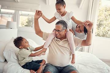 Image showing Family, grandfather and piggy back on bed, having fun and bonding. Support, love and care of grandpa, mom and kids playing, enjoying quality time together and relaxing in house on weekend in bedroom.