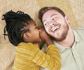 Image showing Happy, whisper secret and child in an interracial family with father with a smile about adoption above. Dad, girl and kid care of a man with happiness, love and parent care on a home carpet bonding